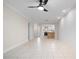Open living room with kitchen view and shiplap wall at 1439 Mediterranean Dr # C, Punta Gorda, FL 33950