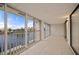 Bright sunroom with water views and sliding glass doors at 1439 Mediterranean Dr # C, Punta Gorda, FL 33950