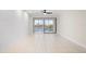 Bright living room with water views and shiplap wall at 1439 Mediterranean Dr # C, Punta Gorda, FL 33950