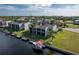 Aerial showcasing waterfront property and boat dock at 1439 Mediterranean Dr # C, Punta Gorda, FL 33950