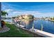 Private dock with boat lift providing easy water access at 1439 Mediterranean Dr # C, Punta Gorda, FL 33950