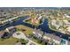 Aerial view of waterfront property with community and canal views at 1439 Mediterranean Dr # C, Punta Gorda, FL 33950