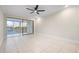 Bright bedroom with tile floors and water views at 1439 Mediterranean Dr # C, Punta Gorda, FL 33950