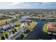 Aerial view showcasing the property's waterfront location and community at 1439 Mediterranean Dr # C, Punta Gorda, FL 33950