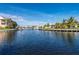 Waterfront community with homes and boats along a canal at 1439 Mediterranean Dr # C, Punta Gorda, FL 33950