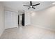 Spacious bedroom with ample closet space and tile floors at 1439 Mediterranean Dr # C, Punta Gorda, FL 33950