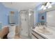 Bathroom with shower stall and updated vanity at 26485 Rampart Blvd # D28, Punta Gorda, FL 33983