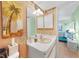 Clean bathroom with single sink and view of bedroom at 26485 Rampart Blvd # D28, Punta Gorda, FL 33983