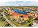 Aerial view of community with waterways and manicured landscaping at 3322 Purple Martin Dr # 135, Punta Gorda, FL 33950