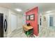 Hallway with stylish decor and functional furniture, connecting different areas of the home at 3322 Purple Martin Dr # 135, Punta Gorda, FL 33950