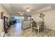 Open-concept living space with ceiling fans, patio, and an adjacent dining area at 3322 Purple Martin Dr # 135, Punta Gorda, FL 33950