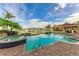 Stunning pool area overlooking the water with a gazebo and comfortable lounge seating at 3322 Purple Martin Dr # 135, Punta Gorda, FL 33950