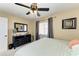 Bedroom with a dresser, ceiling fan and window at 3322 Purple Martin Dr # 135, Punta Gorda, FL 33950