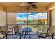 Balcony with patio furniture and water views at 3322 Purple Martin Dr # 135, Punta Gorda, FL 33950