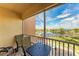 Spacious balcony overlooking the water with outdoor seating at 3322 Purple Martin Dr # 135, Punta Gorda, FL 33950