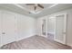 Bright bedroom with double doors leading to another room at 28968 Gin Ln, Punta Gorda, FL 33982