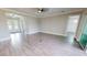 Spacious living area with wood-look tile floors at 28968 Gin Ln, Punta Gorda, FL 33982