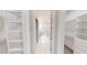 Spacious walk-in closet with built-in shelving at 28968 Gin Ln, Punta Gorda, FL 33982
