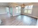 Spacious dining room with hardwood floors and sliding glass doors at 28968 Gin Ln, Punta Gorda, FL 33982