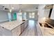 Open concept kitchen with large island and stainless steel appliances at 28968 Gin Ln, Punta Gorda, FL 33982