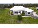 Single-Gathering home with metal roof and landscaping at 28968 Gin Ln, Punta Gorda, FL 33982