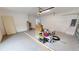 Unfinished garage with epoxy floor and ample space at 28968 Gin Ln, Punta Gorda, FL 33982