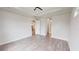 Bright bedroom with hardwood floors and access to bathroom at 28968 Gin Ln, Punta Gorda, FL 33982
