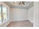 Spacious office with large window and ceiling fan at 28968 Gin Ln, Punta Gorda, FL 33982
