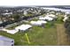 Aerial view of property and waterfront neighborhood at 28968 Gin Ln, Punta Gorda, FL 33982