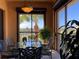 Private balcony with outdoor furniture and scenic views at 98 Vivante Blvd # 98412, Punta Gorda, FL 33950