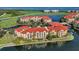Exclusive waterfront condos with lush landscaping and golf course views at 98 Vivante Blvd # 98412, Punta Gorda, FL 33950