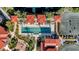Aerial view of community pool and tennis courts at 98 Vivante Blvd # 98412, Punta Gorda, FL 33950