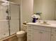 Clean bathroom with a single sink vanity, toilet and shower/tub combo at 98 Vivante Blvd # 98412, Punta Gorda, FL 33950