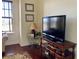Cozy living area featuring a large flat-screen TV and ample space for relaxation at 98 Vivante Blvd # 98412, Punta Gorda, FL 33950
