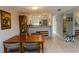 Bright dining area with kitchen view at 9209 Seminole Blvd # 117, Seminole, FL 33772
