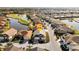 Beautiful aerial view of the home, situated near a golf course and a tranquil lake at 1712 Lastingham Ln, Port Charlotte, FL 33980