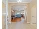 Bright and spacious entryway with views into the living room and dining areas at 1871 Mossy Oak Dr, North Port, FL 34287