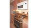 Gas range, microwave, and built-in oven featured in this kitchen at 21277 Edgewater Dr, Port Charlotte, FL 33952