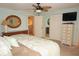 Spacious bedroom with ensuite bathroom access and ample closet space at 21277 Edgewater Dr, Port Charlotte, FL 33952