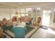 Relaxing sunroom with wicker furniture and pool view at 21277 Edgewater Dr, Port Charlotte, FL 33952
