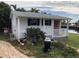 Charming guest house with pink door and waterfront views at 21277 Edgewater Dr, Port Charlotte, FL 33952