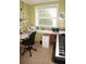 Home office with desk, chair, and built-in shelving at 21277 Edgewater Dr, Port Charlotte, FL 33952