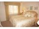 Bedroom with a comfortable bed and plenty of natural light at 21277 Edgewater Dr, Port Charlotte, FL 33952