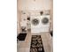 Laundry room with washer, dryer, and utility sink at 21277 Edgewater Dr, Port Charlotte, FL 33952
