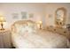 Bedroom with a floral comforter and matching pillows at 21277 Edgewater Dr, Port Charlotte, FL 33952