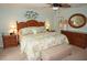 Main bedroom with king-size bed and access to the pool at 21277 Edgewater Dr, Port Charlotte, FL 33952