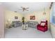 Living room with plaid couches and a recliner at 22375 Edgewater Dr # 239, Port Charlotte, FL 33980