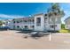 Building exterior showcasing ample parking at 22375 Edgewater Dr # 239, Port Charlotte, FL 33980