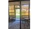 Sunroom with patio furniture and access to backyard at 175 Kings Hwy # 411, Punta Gorda, FL 33983