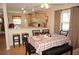 Dining area with kitchen access and breakfast bar at 175 Kings Hwy # 411, Punta Gorda, FL 33983